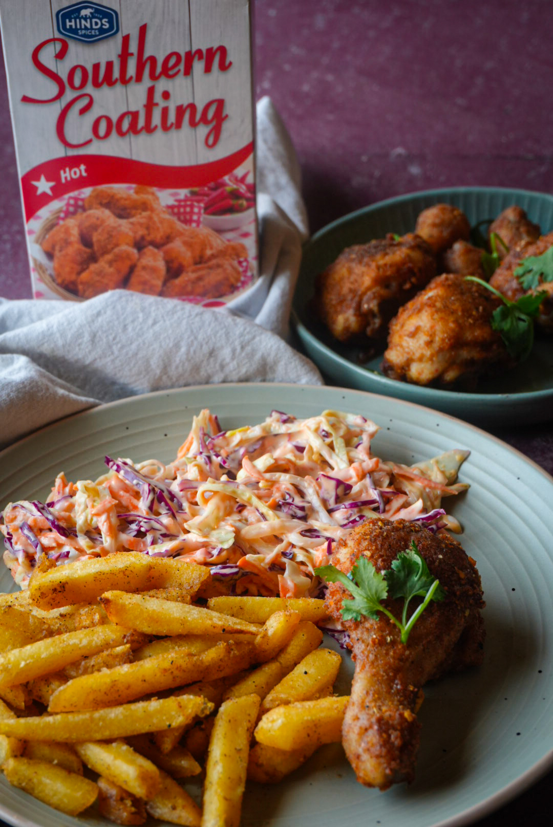 Hinds Southern Coating fried chicken plated with coleslaw and fries for Rhodes Food Group